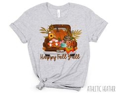 "Are you ready for the Autumn Season? Show off your love for fall in this Happy Fall Y'all T Shirt designed for every fall lover. It is the perfect fall gift for your friend or loved one. Growing up in the country, I had to feature a truck pulling pumpkins and wheat! It is perfect to wear to Halloween Party or Thanksgiving Dinner! Not interested in this design? I have several other Fall Shirts listed below! More Fall Shirts & Fall Mugs Here: https://www.etsy.com/shop/thatbamfam?section_id=33794364 MULTIPLE COLOR OPTIONS OFFERED! PRODUCT DETAILS & SIZING + 100% combed ring spun cotton Bella Canvas shirts + Light fabric + Tear away label + Size chart can be found on listing photos + Unisex fit, runs true to size + Pre-shrunk Fabric SHIPPING AND PRODUCTION TIME - Production time is 3-5 busine Graphic Print Tops For Birthday In Fall, Fall Crew Neck Birthday T-shirt, Crew Neck Birthday T-shirt For Fall, Cute Fall Birthday Tops, Birthday Gift For Bestie, Fall Graphic Tees, Autumn Shirts, Gift For Bestie, Outfit Birthday