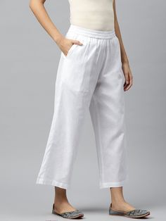 An amazing range of women's bottom wear in soft and solid colors that looks perfect for regular wear.  Description  Size - Measuring Unit     : Regular Size                                   :  ( S, M, L, XL, XXL )  Fit                                      :Regular Fit Ideal For                           :Women Fabric                               :Pure Cotton Occasion                         :Casual Color                                : White Brand Color                     : White Pattern White Ankle-length Pants For Spring, White Plain Bottoms For Summer, Plain White Summer Bottoms, White Wide Leg Bottoms, Spring White Ankle-length Bottoms, Relaxed Fit Ankle-length Pants For Loungewear, White Capris With Pockets For Loungewear, Casual White Plain Pants, Relaxed Fit Ankle-length Pants