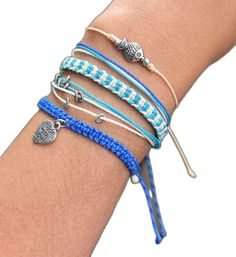 Blue Bohemian Braided Bracelets For Beach, Blue Bohemian Braided Bracelet For Beach, Casual Strand Friendship Bracelets For Beach Party, Blue Friendship Bracelets For Vacation, Handmade Strand Braided Bracelets For Beach, Turquoise Braided Bracelets For Summer Beach, Handmade Braided Strand Bracelets For The Beach, Blue Handmade Friendship Bracelets For Beach, Handmade Braided Bracelets For Beach