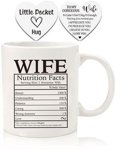 two coffee mugs with the words'wife nutrition fact'and heart shaped magnets