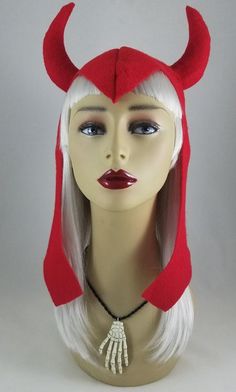 a wig with horns on top of it