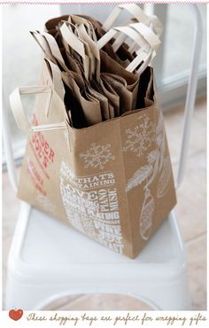 a brown paper bag sitting on top of a white chair