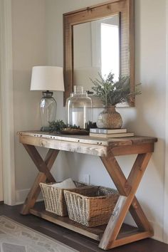 a wooden table with baskets under a mirror