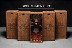 three wooden wine boxes with the words groomsmen gift written on them