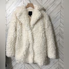 Excellent Condition Like Brand New Winter White Fluffy Long Sleeve Outerwear, Casual Spring Fluffy Fur Coat, Casual Fluffy Fur Coat For Spring, Casual Fluffy Outerwear For Spring, Trendy Fluffy Outerwear For Fall, Chic White Fluffy Outerwear, Casual White Fur Coat For Spring, Casual White Spring Fur Coat, Trendy Fluffy Fur Coat For Spring