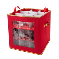 a red storage box filled with lots of paper and plastic bags on top of it