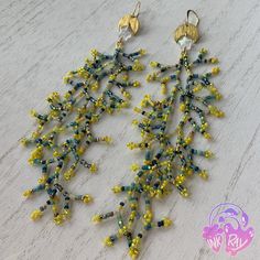 Details: 🌩️Beads are professional quality Japanese and Czech glass seed beads. 🌩️Moon charm is made of brass. 🌩️Star beads are made from glass with a matte aurora borealis finish, they shine like rainbows in the sun! 🌩️Ear hooks are 22kt gold plated brass, lead and nickel free- they are safe for sensitive ears! 🌩️Thread is strong, Japanese nylon made for beading. 🌩️Length from top of the hook to the longest fringe is 6 inches. 🌩️Each earring is approx .28 oz or 8g, making them lightweight and easy to wear! 🌩️Feel free to email or message me with any questions :) You can find more of my work on Facebook, Instagram, and TikTok: https://facebook.com/inkray.art https://www.instagram.com/inkray.beadwork/ tiktok.com/@inkray.beadwork Handmade Iridescent Round Bead Earrings, Handmade Iridescent Earrings With Round Beads, Iridescent Beaded Jewelry For Festivals, Iridescent Beaded Dangle Earrings, Adjustable Iridescent Beaded Earrings, Gold Earrings With Czech Glass And Spacer Beads, Star Beads, Long Fringes, Coral Earrings