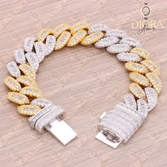 ♥ Materials: 2 Tone Solid 925 Sterling Silver, with Yellow & White gold finish. ♥ Chain Style: Hip Hop ♥ Width: 18mm ♥ Length: 8.0" Inch ♥ Diamond: Cubic Zirconia ♥ Total Carat Wt.: 45.31Cts ♥ Stamp: S925 ♥ Ready to Ship (S925 8" Yellow & White Gold Plated Bracelet) High quality solid sterling silver Ring, Earring, Pendant, Bracelet, Chain and Hip-hop collection from India. A variety of unique designs and styles to choose from. This engagement ring is a beautifully crafted piece of jewelry that Yellow Jubilee Bracelet For Anniversary, Anniversary Yellow Jubilee Bracelet, Gold Cuban Link Sterling Silver Bracelet, Gold Cuban Link Bracelet In Sterling Silver, Gold Sterling Silver Bracelet With Cubic Zirconia For Anniversary, Gold Sterling Silver Bracelets With Diamond Accents, Gold Sterling Silver Tennis Bracelet With Diamond Accents, Gold Bracelets With Diamond Accents In Sterling Silver, Gold Sterling Silver Tennis Bracelet For Anniversary