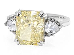 Bella Luce® canary and white diamond simulants 12.04ctw rectangular octagonal, round, and pear rhodium over sterling silver Ice Flower Cut ring. Measures approximately 0.81"L x 0.44"W and is not sizable. The diamond equivalent weight is 7.29ctw. Cubic Zirconia Flower Ring With Vvs Clarity, Dazzling White Cubic Zirconia Flower Ring, White Flower-shaped Cubic Zirconia Jewelry, Luxury Yellow Sterling Silver Diamond Ring, White Flower-shaped Cubic Zirconia Diamond Earrings, Ice Flower, Ring Spacer, School Jewelry, Diamond Simulant