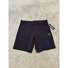 Elevate Your Skate Style With These Tony Hawk Skate Shorts. These Shorts Are Made With A Comfortable Blend Of Cotton And Spandex, Providing A Stretchy And Breathable Fit. The Solid Blue Color And Regular Fit Make Them A Versatile Addition To Any Skate Outfit. Featuring A Zip Closure And A 9-Inch Inseam, These Shorts Are Perfect For Any Skate Activity. The Stretchy Material Ensures A Comfortable And Flexible Fit, While The Tony Hawk Brand Adds A Touch Of Style. These Shorts Are A Must-Have For Any Skate Enthusiast. Skate Outfit, Skate Shorts, Tony Hawk, Skate Style, Stretchy Material, Cotton Spandex, Mens Shorts, Everyday Wear, Blue Color