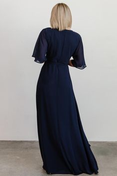 Beautiful flowing chiffon material Fully lined except sleeves Darted bust detail for a tailored fit Kimono style sleeve True wrap style 100% Polyester Marianne is 5'6", size 4 and wearing size S Fashion Tape, Baltic Born, Wrap Maxi Dress, Mob Dresses, Maxi Dress Navy, Chiffon Material, Home Dress, Flattering Dresses, Feminine Dress