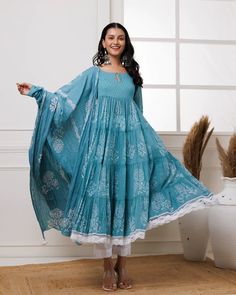 Beat the heat with effortless style in our Light Blue Hand Block Printed Anarkali Set. Made with the finest mul-mul fabric, this suit set is perfect for making a fashion statement even in soaring temperatures. Stay cool and chic even in heat. No. of pieces - 3 piece set. Color - Light Blue. Fabric - Mul-Mul. Washing Instructions - Dry Clean. Blue Cotton Sharara With Sheer Dupatta, Designer Cotton Maxi Length Sets, Bohemian Blue Anarkali Set For Eid, Blue Long Sleeve Cotton Anarkali Set, Cotton Maxi Length Sets For Designer Wear, Blue Anarkali Lawn Suit With Block Print, Anarkali Blue Lawn Suit With Block Print, Blue Palazzo Set With Unique Design And Long Sleeves, Bohemian Blue Anarkali Set With Chikankari Embroidery