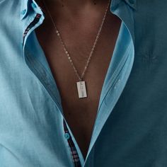 "Discover the essence of personal style with our meticulously crafted 925 sterling silver men's necklace. Designed as a canvas for your individuality, this engravable piece allows you to imprint it with your story, be it a name, a significant date, or a heartfelt message. The allure of this necklace lies not only in its exceptional craftsmanship but also in its minimalist design that seamlessly transitions from everyday wear to special occasions. Its understated elegance exudes sophistication, enhancing your ensemble with a touch of refined masculinity. Choose from the exquisite gold, sleek silver, or bold black finishes to suit your taste and style. Each variation carries its own unique charm, making it an impeccable accessory that embodies your personality. More than just an accessory, t Minimalist Sterling Silver Necklace For Father's Day, Minimalist Rectangular Pendant Necklace For Father's Day, Father's Day Minimalist Rectangular Pendant Necklace, Minimalist Rectangular Pendant Necklace With Engraved Text, Minimalist Dog Tag Necklace For Father's Day, Silver Necklace With Engraved Rectangular Pendant, Father's Day Sterling Silver Necklace With Rectangular Pendant, Silver Necklaces With Engraved Text For Father's Day, Silver Necklace With Engraved Text For Father's Day