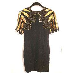 "Vintage 1980s Stenay Black Gold Sequin Beaded SILK Short Slv Dress Sz Petite 2  Stunning vintage dress in good condition! Dress is covered in sequins and beads and have scalloped short sleeves. Zips in back, has key-hole and vent. Dress is lined.  Size 2 Petite: Bust: Up to 36\" Waist: 28\" Hip: 34\" Length: 35.5\"" Vintage Beaded Dresses For Night Out, Scalloped Shorts, Silk Shorts, Sequin Beading, Gold Sequin, Key Hole, Vintage Dress, Dress Clothes For Women, Vintage Dresses