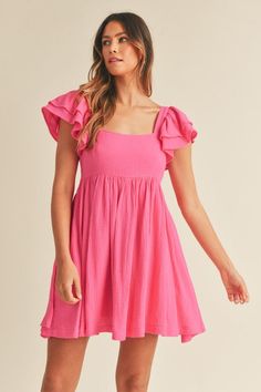 The Doll Dress is a short ruffle tier flutter sleeve solid crinkle gauze babydoll mini dress with self-tie detail! Winter Formal Dresses Flowy, Dresses For Winter Formal, Short Dresses With Sleeves, Casual Pink Dress, Brunch Dresses, Short Casual Dresses, Crinkled Fabric, Banquet Dress, Babydoll Mini Dress