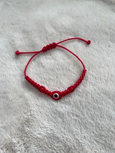 Beautiful Handmade Braided Evil Eye Bracelet in Red with Red Evil Eye. Use For Protection & Good Luck! Red Eye Bracelet, Evil Eye Bracelet Red, Handmade Red Evil Eye Bracelet, Adjustable Red Bracelet For Beach, Handmade Red Casual Friendship Bracelets, Casual Red Handmade Friendship Bracelets, Handmade Adjustable Red Evil Eye Bracelet, Red Bracelet With Sliding Knot For The Beach, Handmade Red Braided Bracelets For Beach