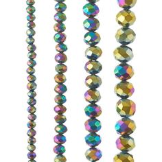 multicolored beads are lined up on a white background