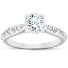 a white gold engagement ring with diamonds on it