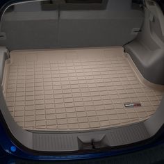 the floor mat is clean and ready to be put into the car's trunk