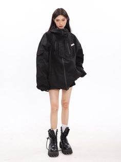 Our oversized windbreaker jacket is your perfect companion for breezy days. Its relaxed fit offers comfort and style - taking your look to a whole new level, while the quilted interior will keep you warm. Model is 5'5 100lbs wearing L Oversized Black Long Sleeve Parka, Oversized Techwear Track Jacket For Winter, Oversized Black Hooded Windbreaker, Black Oversized Windbreaker With Adjustable Hood, Oversized Windproof Outerwear For Streetwear, Black Utility Jacket With Adjustable Hood For Streetwear, Oversized Black Windbreaker With Adjustable Hood, Black Oversized Techwear Parka, Oversized Long Sleeve Techwear Windbreaker