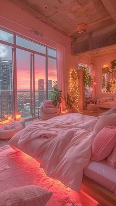 a bedroom with pink bedding and lights on the windows, overlooking cityscape