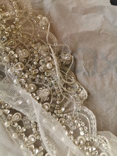 "These gorgeous bridal straps (set of 2) are made of rhinestones, pearls and beads on tulle base. They are curved shaped to give shape of cap sleeve hence can be attached to sleeveless or off shoulder gowns. The price is for a set of two pieces of the product. Dimensions: Length - 18 inches( $132) 20 inches ($136) Width at centre (from top till the bottom of hanging beads) - 3 3/4 inches Width at centre (from top till the bottom of drop shaped stone) - 3 inches Width at edge - 1/2 inch The strap Off Shoulder Gowns, Bridal Straps, Wedding Dress Straps, Dress Straps, Off Shoulder Gown, Hanging Beads, Wedding Dresses With Straps, Bead Caps, Strap Dress