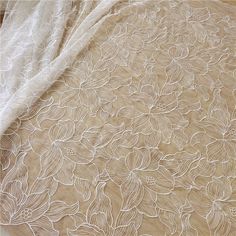 Gorgeous super big flower tulle lace fabric made your eyesight enjoyable. Wide : 130cm. Price is for 1 yard long. We will ship in one piece continue without cutting if you order more than 1 quantity. Very luxury and romantic. It can be used for baby dress, prom dress, bridal gowns, tops, garment fabric, skirts, curtains We offer special discounts for designers and wholesale orders! Please send us your phone number if you choose Express delivery! Please don't hesitate to contact us if you have an Red Carpet Affair, Wedding Dress Crafts, White Lotus Flower, Bridal Headwear, Wedding Dress Patterns, Bridal Lace Fabric, Garment Fabric, For Wedding Dress, Wedding Dress Fabrics