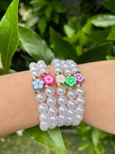 Cute pearl bracelets to light up your Summer!🌸 Comes in 5 beautiful different colors!🤍💚💜 White Bracelets For Summer Party, White Summer Party Bracelets, Adjustable Flower Pearl Bracelets, Adjustable Flower-shaped Pearl Bracelets, Adjustable Pearl Bracelet With Flower Shape, White Bracelets For Spring Party, Adjustable White Pearl Bracelet For Spring, Trendy White Flower Beaded Bracelets, Bracelets Preppy