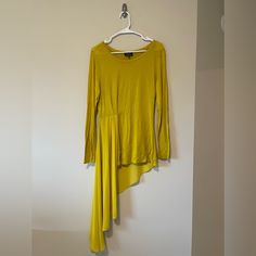 This Asymmetrical Blouse From Modx Is Sure To Turn Heads And Make A Statement! See Photos For Materials/Care. Spring Stretch Blouse With Asymmetrical Hem, Spring Blouse With Asymmetrical Hem And Stretch, Chic Yellow Asymmetrical Top, Fitted High-low Hem Tops For Fall, Spring Yellow Tops With Asymmetrical Hem, Yellow Tops With Asymmetrical Hem For Spring, Asymmetrical Blouse, Walker Boots, Garment Bags