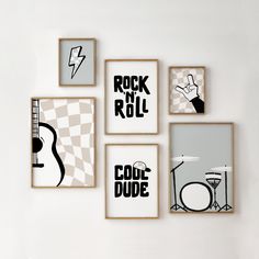 four framed art pieces with rock and roll designs on them in various shapes and sizes