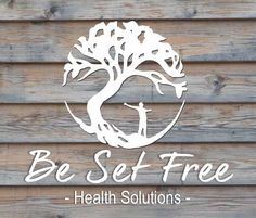 the be self free logo is shown on a wooden wall with an image of a tree