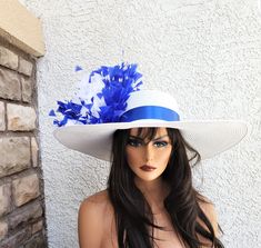 WOW large bold White gloss straw with Royal blue and white feathers. The hat has a tie szie adjustment in the inside crown. Brim 6 1/4 Fancy Tea, Boulder City, Kentucky Derby Hat, Derby Hat, Quality Hats, White Feathers, Blue Hat, Derby Hats, Dress Hats