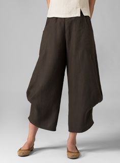 Linen Flared Leg Crop Pants White Chic Baggy Wide-leg Pants, Chic Baggy Harem Pants With Pockets, Chic Baggy Ankle-length Pants, Elegant Loose Fit Bottoms For Fall, Elegant Ankle-length Relaxed Fit Harem Pants, Chic Tapered Leg Harem Pants With Pockets, Chic Harem Pants With Tapered Leg And Pockets, Chic Solid Color Relaxed Fit Harem Pants, Chic Relaxed Fit Wide Leg Pants With Side Pockets