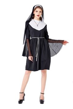 a woman in a nun costume is standing with her hands on her hips and wearing black shoes