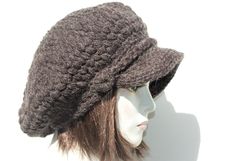 "Style: classic slouchy newsboy hat. It has a solid double-layer brim and a strap with button. Material: a mix of yarns of different structure and color. 10% wool, 10% mohair, 80% acrylic Color: red color hat on this auction but you will find other color options on my auctions. https://www.etsy.com/shop/GreenCatStudio?ref=seller-platform-mcnav&section_id=14355600 Characteristics hat:chunky,soft,warm,cozy,unique Size: Hat Circumference: 22\" - 23\" Hat Height: 10\" You can also buy a hat with Warm Slouchy Solid Color Hat, Slouchy Hats For Cold Weather, Slouchy Solid Knitted Hats, Slouchy Knitted Solid Color Hat, Solid Color Slouchy Knitted Hat, Slouchy Brimmed Beanie For Fall, Knitted Slouchy Hat, Casual Slouchy Brown Hat, Slouchy Yarn Cap