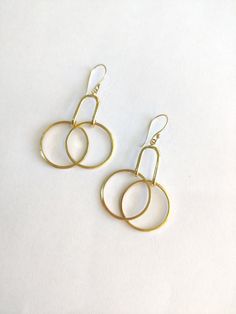 These Handmade Gold Minimal Earrings scream PRETTY all the way! Say more with less is what minimalism is - Get these beautiful Geometric Minimal Dangle & Drop earrings and speak more style and vogue. The earrings can go with everything and you can hop them on in your daily routine. they will work great as office accessories, party earrings as well as gifts :) Specifications: Brass Handmade Gold Plated Minimal earrings Geometric Style Hypoallergenic (suits all skin types) Nickel & Lead-free Everyday Small Hoop Earrings With Ear Wire, Nickel-free Hoop Earrings For Everyday, Nickel Free Hoop Earrings For Everyday, Gift Single Open Circle Hoop Earring, Modern Everyday Plug Earrings With Ear Wire, Handmade Drop Wrap Earrings For Everyday, Modern Plug Earrings For Everyday, Modern Handmade Small Hoop Jewelry, Minimalist Hoop Earrings With Ear Wire