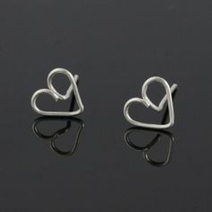 "This unique heart stud earrings are handmade wire wrapped sterling silver. Free US shipping Customers who purchased this item said: \"Very nice. Glad I bought them\" The heart is the ultimate symbol of love. This heart earrings are a perfect gift for the one you love, or for bridesmaid gift, or for birthday gift. We also can customize design for you. The dimension of the earrings is 9mm/3/8inches. ;-) My contact number: 626-379-1904. Please contact me if you would like to order multiples or cus Delicate Sterling Silver Earrings For Mother's Day, Wire Wrapped Jewelry For Valentine's Day Anniversary, Valentine's Day Wire Wrapped Jewelry For Anniversary, Nickel Free Earrings For Valentine's Day, Nickel-free Open Heart Earrings For Mother's Day, Mother's Day Sterling Silver Earrings Gift, Mother's Day Gift Sterling Silver Earrings, Nickel Free Double Heart Earrings As Gift, Dainty Earrings For Valentine's Day Gift