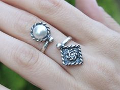 Sterling Silver Ethnic Boho Thumb Adjustable Pearl Spoon Ring, Sun Grunge Ornament White Stone Open Ring, Armenian Jewelry Boho style is a symbiosis of glitz and poverty due to the fact that sometimes incongruous things are combined in clothes. Elements of different cultures harmoniously coexist in it, so this is not just a fashionable direction, it is a whole aesthetic worldview. The girls who prefer this style are usually pacifists who share the idea of world citizenship. Ring width 35*15 mm. Bohemian Open Ring Toe Rings As Gift, Adjustable Bohemian Flower Ring, Bohemian Adjustable Flower Toe Ring, Bohemian Flower Ring For Wedding, Bohemian Silver Toe Rings As Gifts, Bohemian Handmade Toe Rings For Wedding, Bohemian Adjustable Flower Ring For Anniversary, Adjustable Bohemian Toe Rings For Wedding, Adjustable Bohemian Wedding Toe Ring