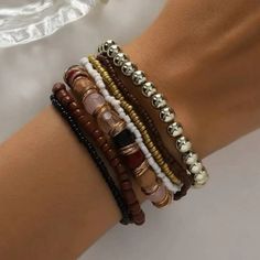 Beautiful Beaded Bohemian Style Stack Bracelet Comes With 7 Individual Stretch Pieces That Can Be Worn Separately Or Stacked Together. Light And Comfortable, This Bracelet Set Can Accentuate Any Outfit, Casual Or Dressy. Style: Bohemian, Boho, Casual Color: Multicolored Soft Pinks, Maroon, Brown, White, & Gold Measurement: Will Fit Up To 7” Wrist, See Pictures For Dimensions. Material: Zinc Alloy This Beaded Bracelet Stack Will Make A Beautiful Addition To Your Fashion Jewelry Collection! Bohemian Bracelet Stack Beaded Bracelet October Love Casual Stretch Beaded Bracelets Diy, October Love, Beaded Bracelet Stack, Boho Bracelets Stack, Stacked Beaded Bracelets, Dressy Style, Stack Bracelet, Bohemian Bracelet, Bracelets Diy