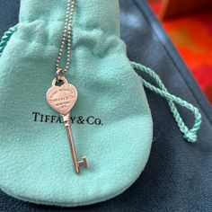 Classic Silver Tiffany & Co. Key With 18” Silver Ball Chain. The Heart-Shaped Key Is Marked With 925 And Says: Please Return To Tiffany & Co. New York. Some Scuff Marks On Back Of Key - See Pics. Chain Is Marked Tiffany & Co. And Ag 925. Comes In Authentic Tiffany Jewelry Pouch. Return To Tiffany, Tiffany Jewelry, Tiffany Co Jewelry, Ball Chain, Jewelry Pouch, Silver Heart, Tiffany & Co., Womens Jewelry Necklace, Heart Shapes