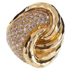 Henry Dunay ring composed of 18K yellow gold with pavé round brilliant-cut diamonds. The ring features a hammered finish. There are 99 round brilliant-cut diamonds that total 2.22 carats, F-G color and VVS-VS clarity. The ring is a size 6 1/2. Hammered Gold Ring, Square Diamond Rings, Tanzanite Diamond Ring, Bold Rings, Vintage Style Rings, Pave Diamond Ring, Vs Diamond, Gold Ring Sets, Hammered Gold