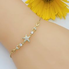 GOLD PLATED JEWELRY Clear Crystals Starfish Adjustable Bracelet Fashion Jewelry The starfish symbolism represents healing and renewal. Like stars, starfish are seen as a celestial symbol and symbolize infinite divine love. We seek to do the best in our work, if there is any problem, please let us know to fix it ASAP. God bless you! U.S. Seller:  Shipping with tracking number. Starfish Symbolism, Divine Love, Bracelet Fashion, Clear Crystals, God Bless You, Plated Jewelry, Adjustable Bracelet, Gold Plated Jewelry, Chain Link Bracelet