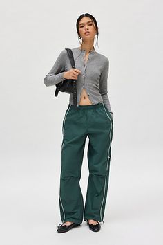 Effortless track pants from BDG. Our BDG Jess nylon track pants have an easy fit with a low rise and a relaxed straight leg. Essential track pants styling with contrasting piping at the sides. Find these staple track pants only at Urban Outfitters. Features BDG Jess nylon track pants Wide leg track pant Mid rise elasticated waistband Side pockets Piping down the legs Relaxed, straight-leg fit Full length Pull-on style UO exclusive Content + Care 100% Nylon Machine wash Imported Size + Fit Model Harem Pants Street Style, Straight Leg Track Pants, Green Adidas Track Pants, Nylon Track Pants, Women Joggers, Track Pants Outfit, Adidas Track Pants, Green Fits, Cute Pants