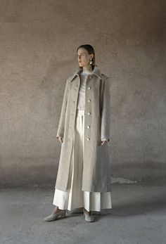 Elevating a modern silhouette, the Criss Cross Raw Hemp Peasant Coat is a timeless coat translated in a versatile wool and hemp blend. Single-breasted, this this elegant style is finished with panels belt and can be worn in different ways. Style over layers to achieve a fluid silhouette. Lined.Composition 60 % wool, 40% hempLining: 60% wool, 40% cottonButtons: 100% metalThis ítem is made of a blend of 40% hemp and 60% wool and it´s undyed.Hemp plants are inherently insensitive to insects and dis Ways To Show Love, Sustainable Clothing, Elegant Style, Criss Cross, Duster Coat, Coats For Women, Insects, Normcore, Villa