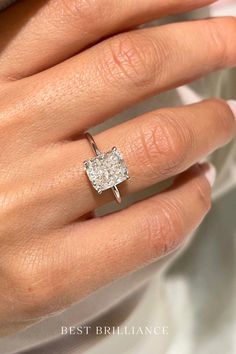 a woman's hand with a diamond ring on top of her finger and the words best bridalnce