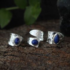 925 silver rings that tell stories of starry skies and ancient civilizations: each of them, with a thick adjustable band and stamped in an ethnic tribal style, is a reminder of the timeless beauty of traditional craftsmanship. At the center, a lapis lazuli captures the eye with its deep blue. Wearing this ring means carrying a fragment of the sky, a symbol of wisdom and truth, perfect for those who love to express their uniqueness with elegance and a touch of mystery PROPERTY Used by healers and Blue Hammered Jewelry As A Gift, Blue Hammered Jewelry As Gift, Blue Hammered Jewelry For Gift, Unique Blue Hammered Jewelry, Blue Sterling Silver Toe Ring, Boho Jewels, Lapis Lazuli Jewelry, Lapis Lazuli Ring, Blue Lapis Lazuli