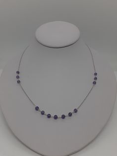 Amethyst 4mm Bead Necklace in Sterling Silver 925 White Rhodium 16 Inches Chain 2 Inches Extended. Product Info: -Amethyst Round. -Metal: Silver Over Rhodium Plated 2 Inches Extended Chain. -Stone : Bead Amethyst. - Stone Measures : 4mm x 4mm -Chain length: 16 Inches with 2 Inches extended. -Total Amethyst Jade Stone : 13 -Finish: White Color. -Handmade item. -Made in USA. -Nice Gift box is include Purple Sterling Silver Jewelry With Polished Beads, Silver Crystal Necklaces With Polished Beads, Lavender Beaded Chain Jewelry For Gifts, Silver Single Strand Round Crystal Necklace, Amethyst Beaded Chain For Jewelry Making, Silver Amethyst Faceted Necklaces, Purple Amethyst Beaded Chain Jewelry, Silver Amethyst Necklace With Faceted Details, Silver Amethyst Briolette Necklace