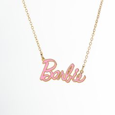 Description Barbie Enamel Necklace Material Brass dipped in 18k gold Size 40 cm with 4 cm extension Color Gold plated - Silver plated Celeb Halloween, Barbie Necklace, Fandom Jewelry, Pink Pens, Celebrity Halloween Costumes, Barbie Stuff, Stacked Necklaces, Enamel Necklaces, Gold Plated Necklace