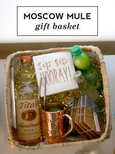 a gift basket filled with alcohol and other items