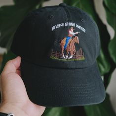 This Cowboy themed embroidered cap is inspired from playing Read Dead Redemption 2 lately. Be Loyal to What Matter is a quote from the protagonist in RDR2, Arthur Morgan. A great gift or piece for everyday wear. Direct embroidery, only available here at Embroidered Dad Hats! 🧢• Embroidered on a cotton dad hat.• Adjusts up to 24" in circumference.• Unstructured and low profile fit.• Free poly-bag shipping in 🇺🇸 (more options at checkout). Cheap Embroidered Dad Hat With Curved Visor, Cheap Embroidered Logo Dad Hat For Summer, Cheap Embroidered Dad Hat For Summer, Cheap Dad Hat With Embroidered Logo, Cheap Summer Dad Hat With Embroidered Logo, Cheap Embroidered Dad Hat, Trendy Embroidered Dad Hat At Cheap Price, Cheap Spring Dad Hat With Embroidered Logo, Cheap Embroidered Logo Dad Hat